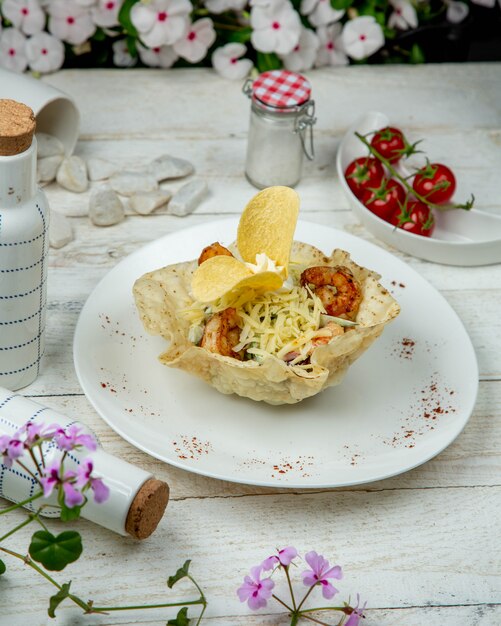 Vegetable salad in lavash with chips.