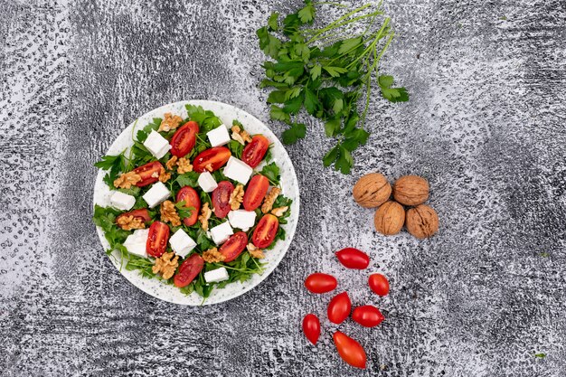 vegetable salad in white plate with ingredients