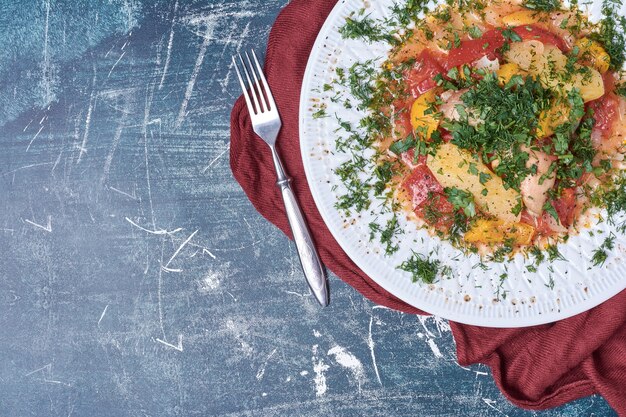 Vegetable salad with herbs and spices.