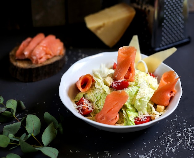 Vegetable salad with salmon fish fillet