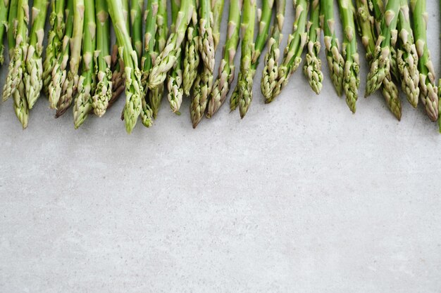 Vegetables. Green asparagus on the table