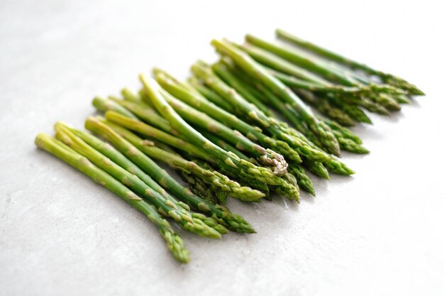 Vegetables. Green asparagus on the table