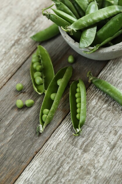 Vegetables. Green peas on the table