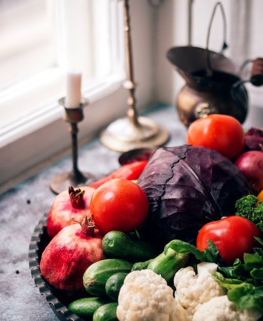 Vegetables and herbs with pomegranate