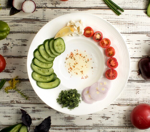 Vegetables and olive oil top view