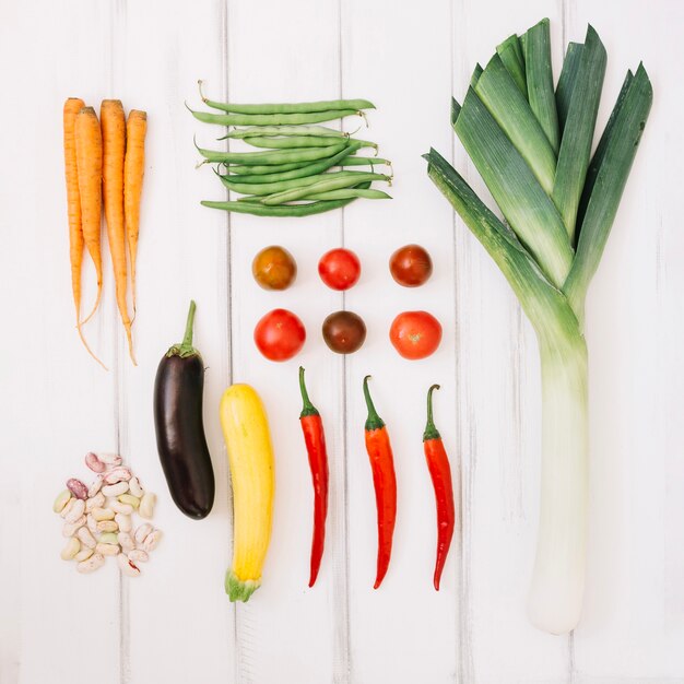 Vegetables on white wooden background