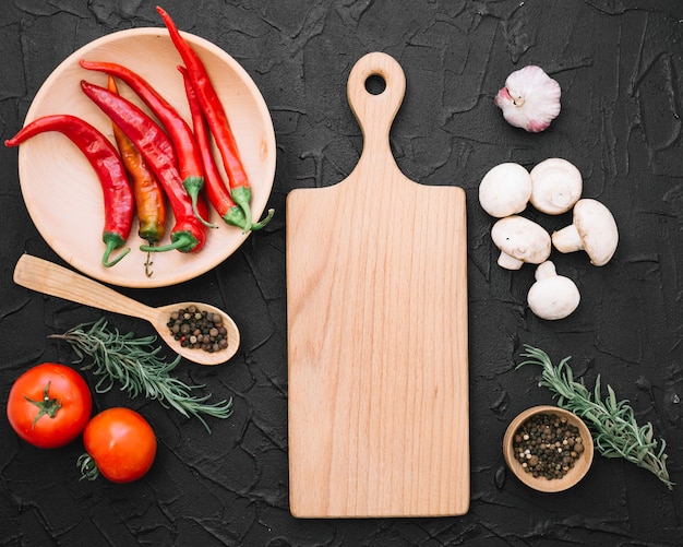 Vegetables and wooden board