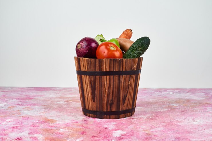 Free Photo vegetables in a wooden bucket.