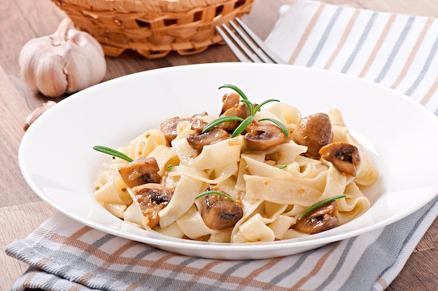 Vegetarian dish with tagliatelle and mushrooms