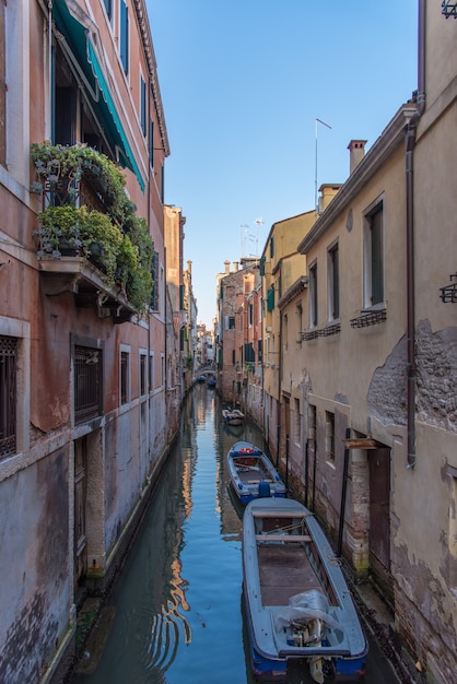 Venice canal with gondola boats