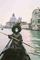 Free photo venice carnival with people wearing traditional costumes with masks