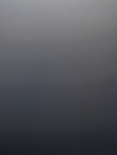 Vertical aerial shot of an ocean background