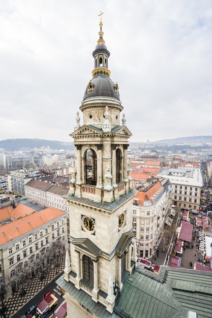 Vertical aerial shot of a tower on the St. Stephen's Basilica in Budapest