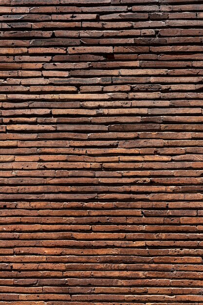 Vertical brown brick wall background