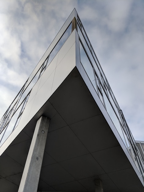 Vertical low angle shot of a high rise triangular building