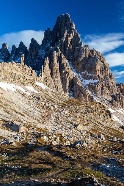 Vertical low angle shot of the Paternkofel mountain in the Italian Alps