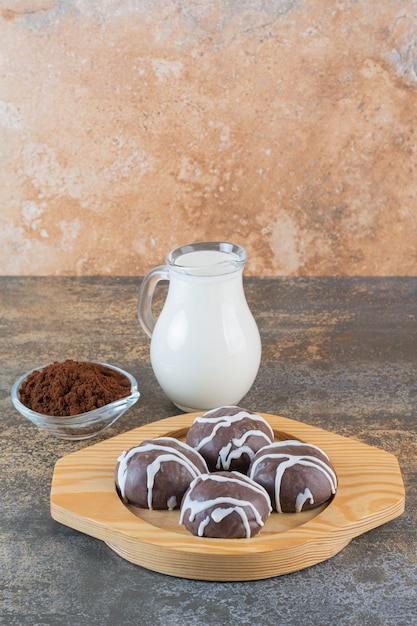 Vertical photo of homemade chocolate cookies with milk 