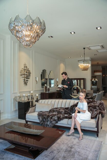 Vertical portrait of beautiful couple in living room