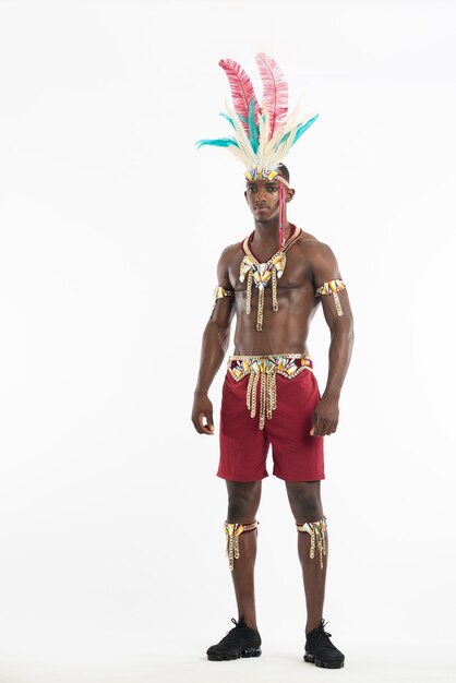 Vertical shot of an African American male wearing traditional clothes