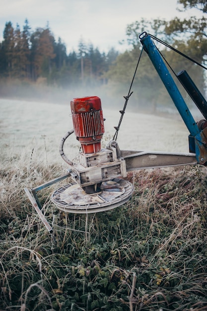 Vertical shot of an agricultural harvester in the field