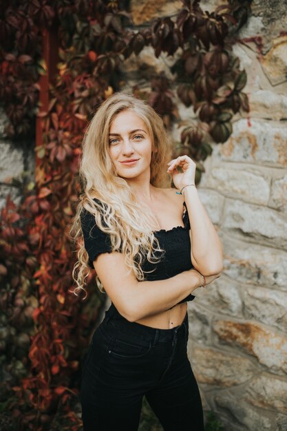 Vertical shot of beautiful smiling girl