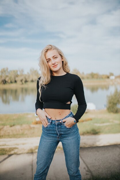 Vertical shot of beautiful smiling girl