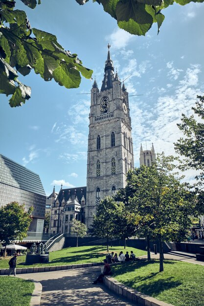 Vertical shot of a cathedral tower in Ghent, Belgium