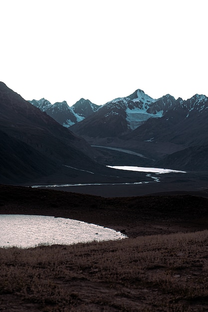 Vertical shot of chandra tal lake, himalaya, spiti valley in a gloomy day