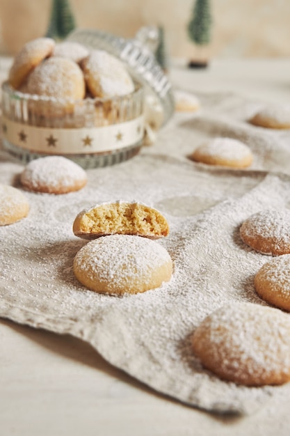 Vertical shot of cookies with sugar powder for Christmas