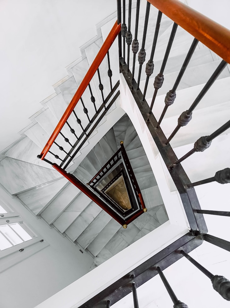 Free Photo vertical shot of a cool white staircase