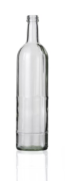 Vertical shot of an empty glass bottle isolated