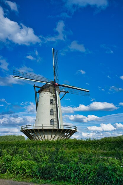 Vertical shot of the Fauconniersmolen windmill in Ghent, Belgium