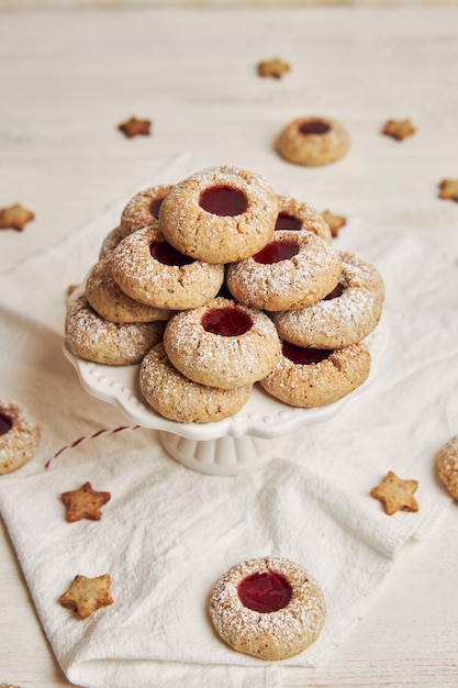 Vertical shot of freshly cooked cookies with jam for Christmas