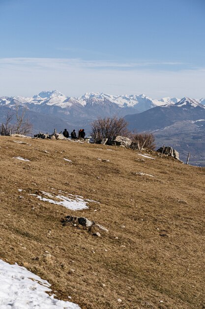 Vertical shot of the ground surrounded by mountains