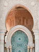 Free photo vertical shot of hassan ii mosque in casablanca, morocco