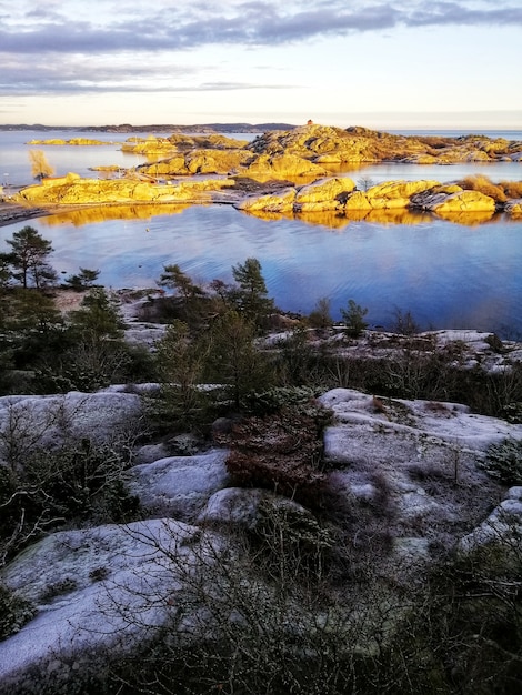 Vertical shot of a mesmerizing lake scenery in Stavern Norway