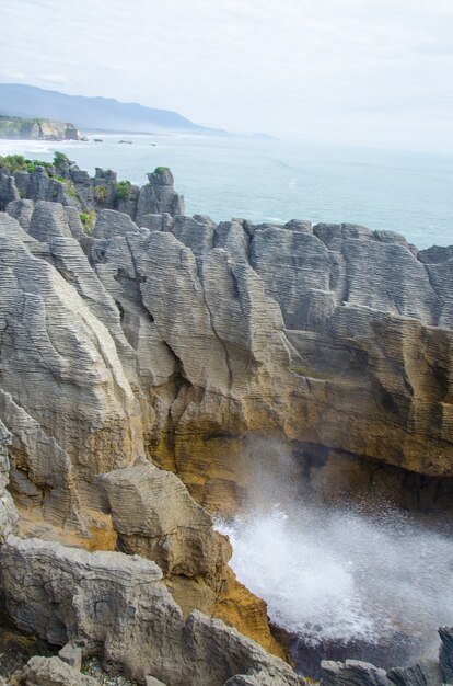 Vertical shot of the Pancake Rocks in New Zealand