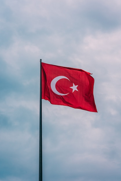 Vertical shot of the Turkey flag  floating in the air