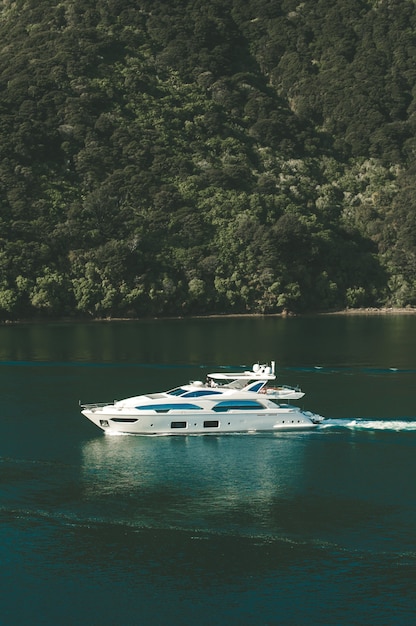 Vertical shot of a yacht on body of water in New Zealand