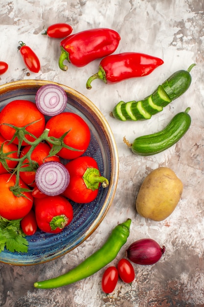 Vertical view of collection of natural fresh vegetables and pepper for dinner cooking