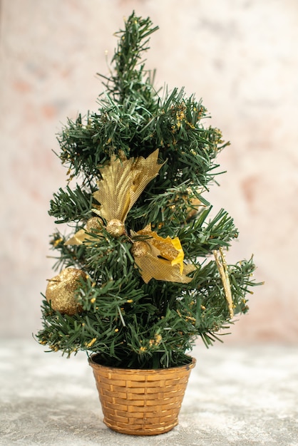 Vertical view of decorated christmas tree on white background