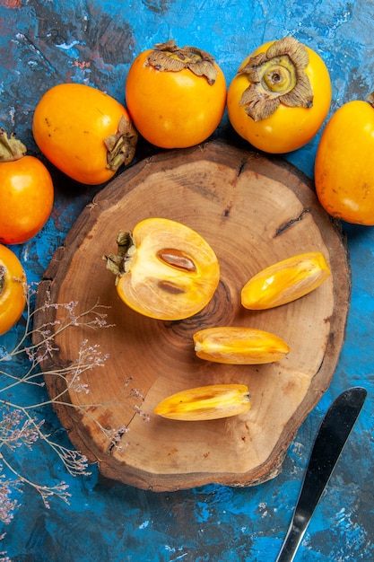 Vertical view of delicious fresh natural diospyros kaki