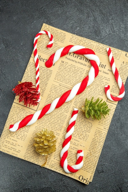 Vertical view of delicious homemade delicious sweets in the form of walking sticks and accesories