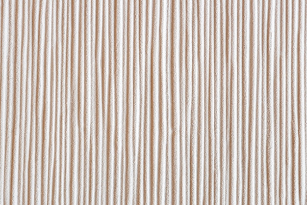 Free photo vertically defined lines on a grainy wall