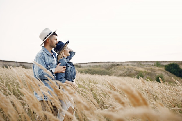 Free photo very beautiful couple in a wheat field