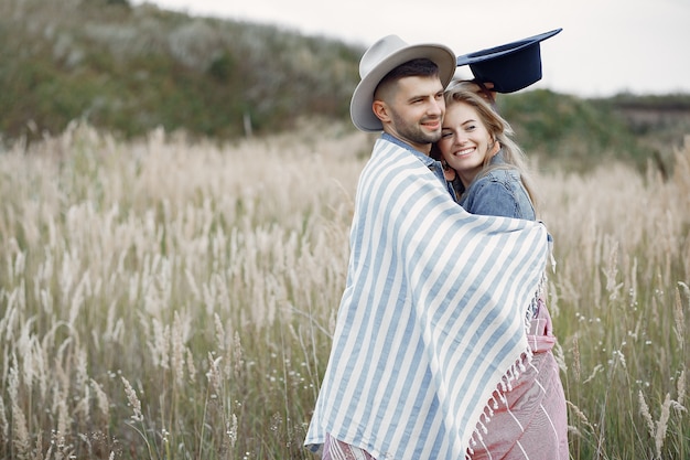 Free photo very beautiful couple in a wheat field