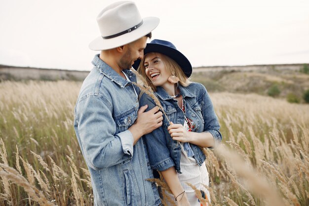 Very beautiful couple in a wheat field