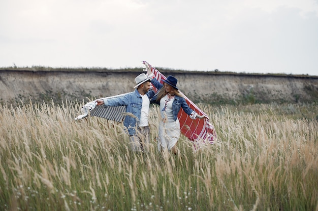 Very beautiful couple in a wheat field