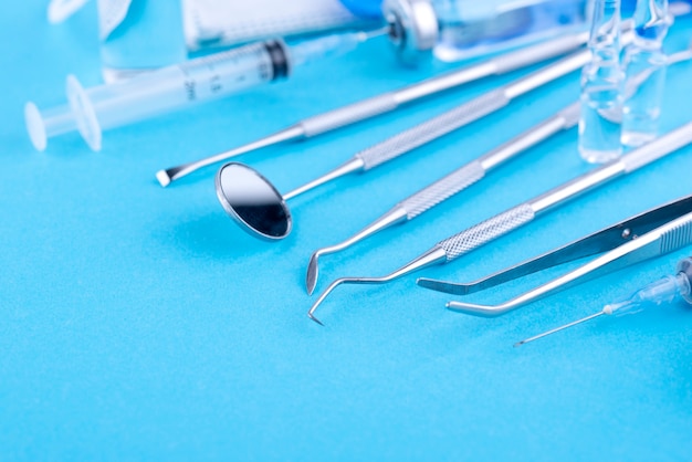 Vials and medical tools arrangement high angle