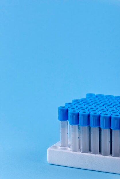 Vials with blue background and lids